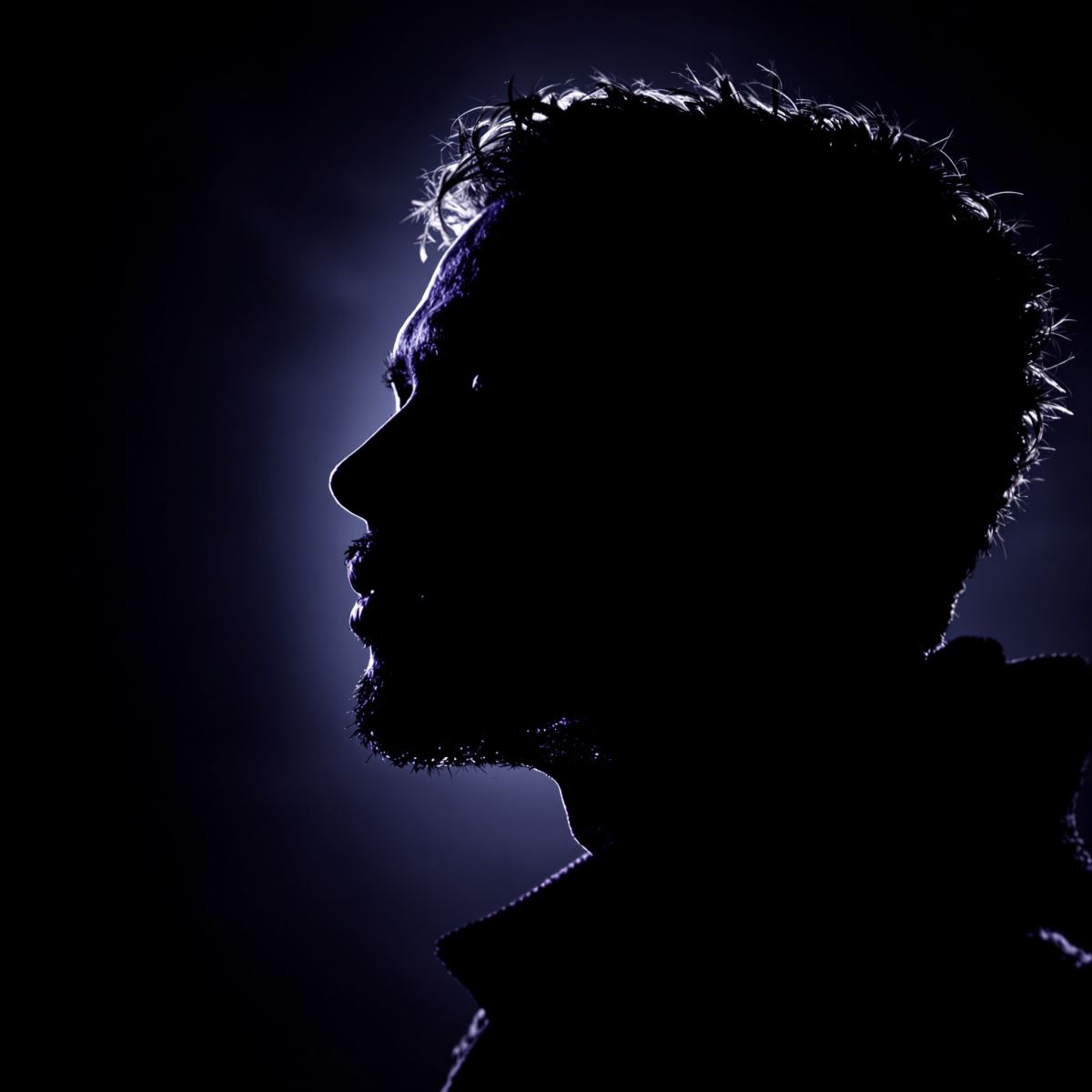 Minimal dark PFP avatar with emotional pull and subtle shadow composition